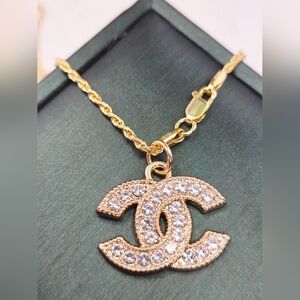 CHANEL With Silver Accents On 20'' Gold Over Chain
